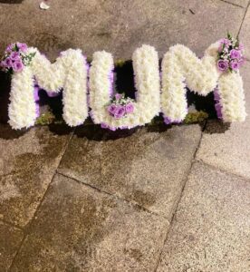Fresh flower MUM letter funeral wreath expressing love and remembrance in Nairobi.