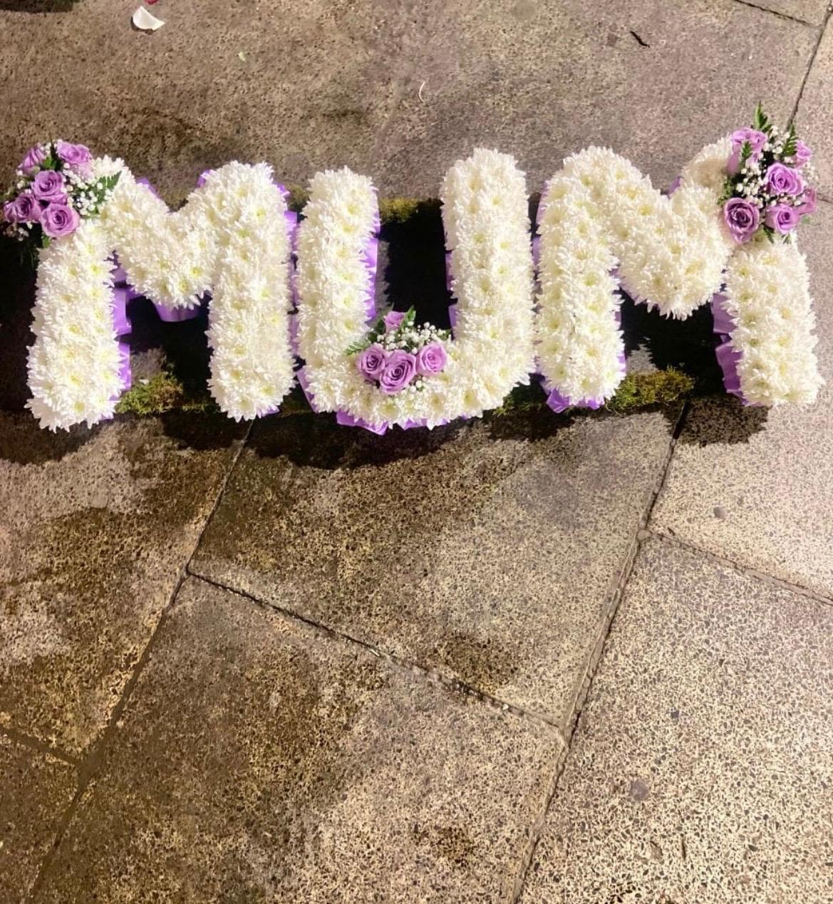 Fresh flower MUM letter funeral wreath expressing love and remembrance in Nairobi.